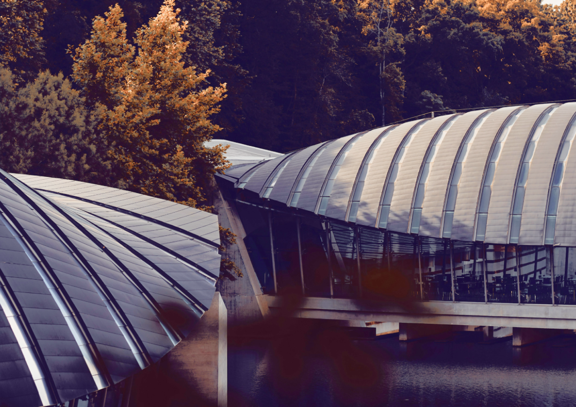 A view of the Crystal Bridges Museum of American Art from across the water.