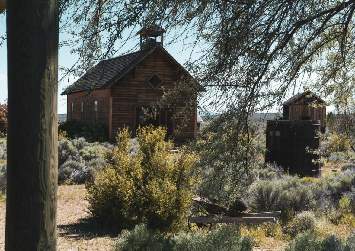 An abandoned church and well, remnants of an old western town in Oregon.